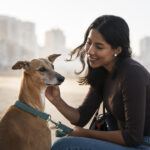 side-view-smiley-woman-with-cute-dog-scaled.jpg